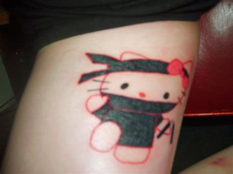 A blog post about a Hello Kitty tattoo that combines the evil cat with the ninja theme. . Tattoo ninja kitty